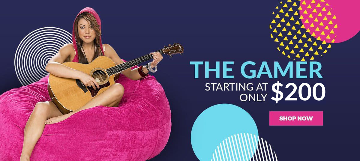 Woman playing guitar on The Gamer Bean Bag. Starting at Only $200